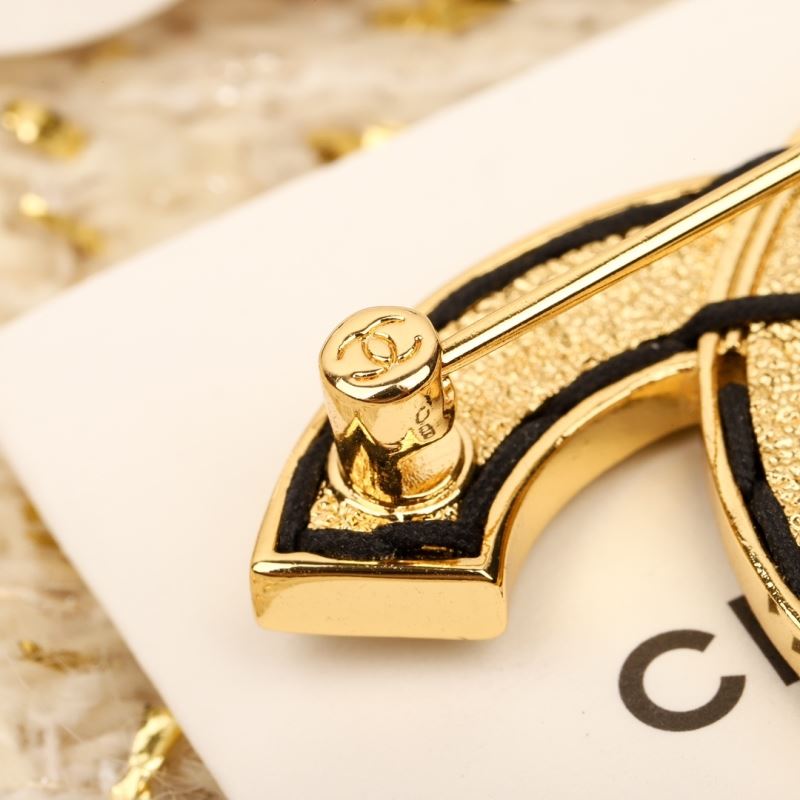 Ch**el brooches